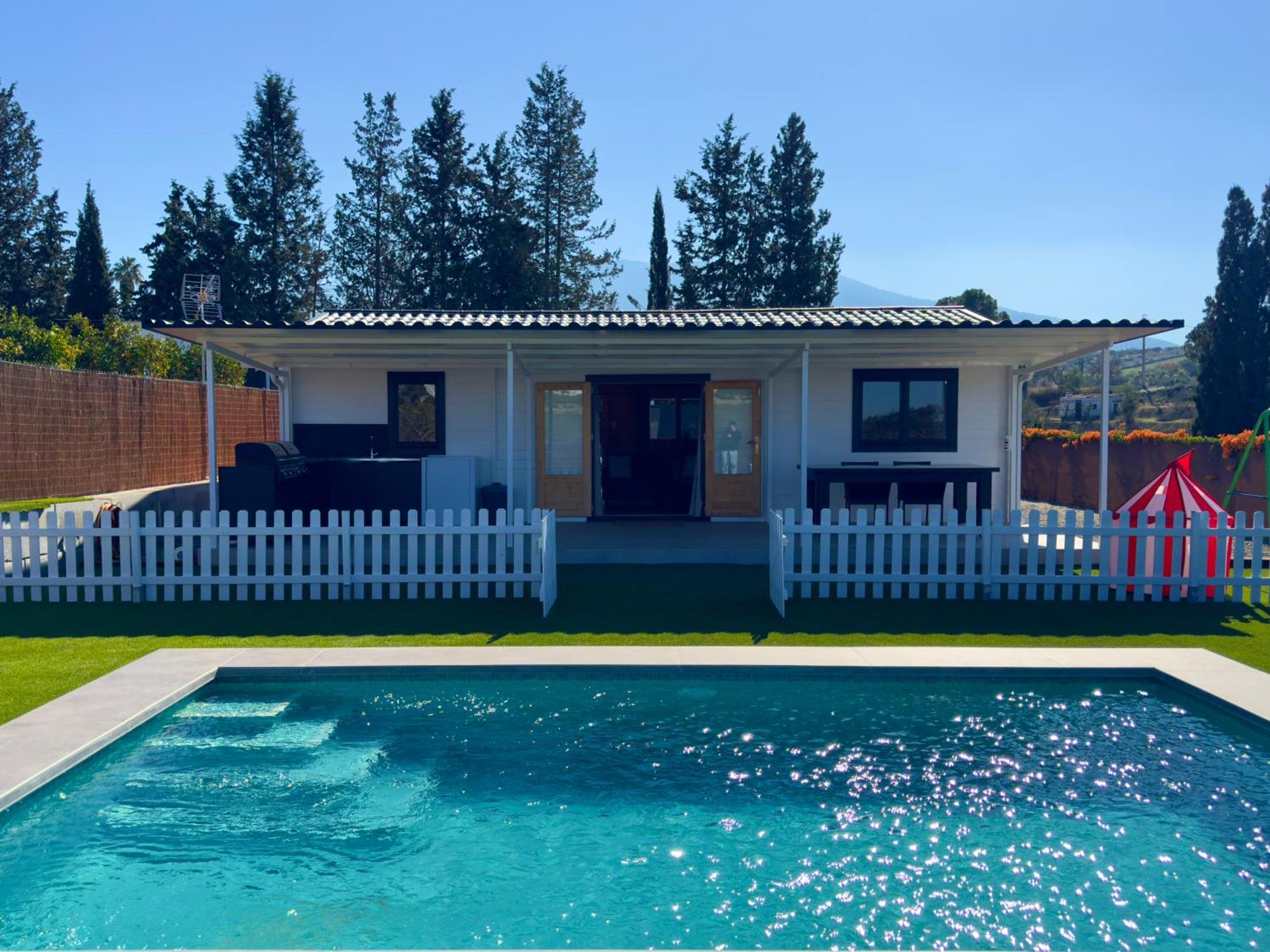 Сasa de vacaciones Casa De Madera La Parcela